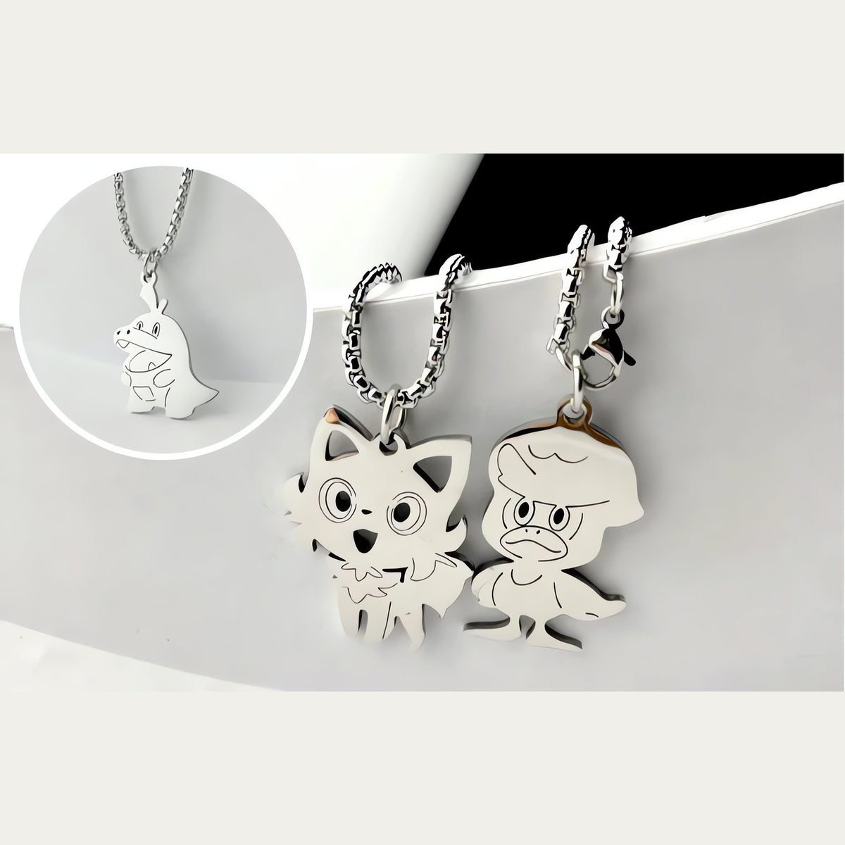 Fuecoco and Quaxly pendant necklaces