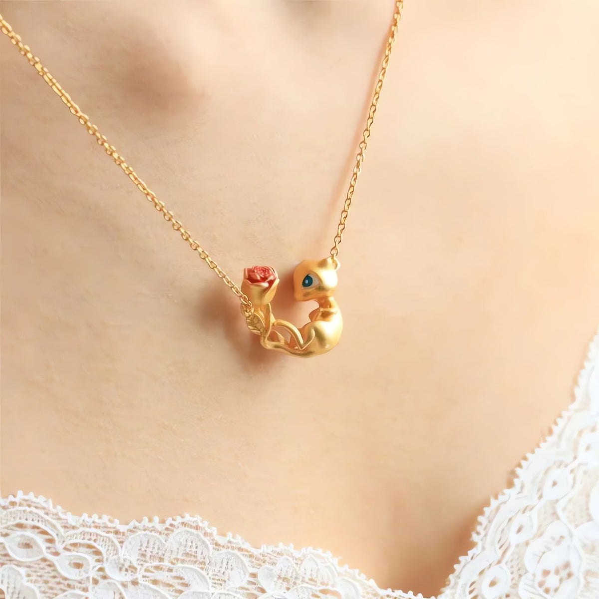 Golden Mew necklace with flower motif – photo 4