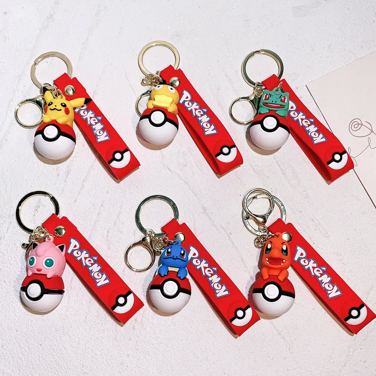 Poké Ball keyring with Pokémon figure charm – photo 2