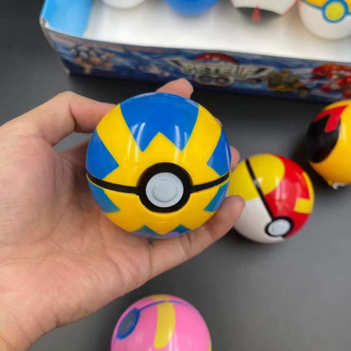Set of eight large Poké Balls with figures – photo 9