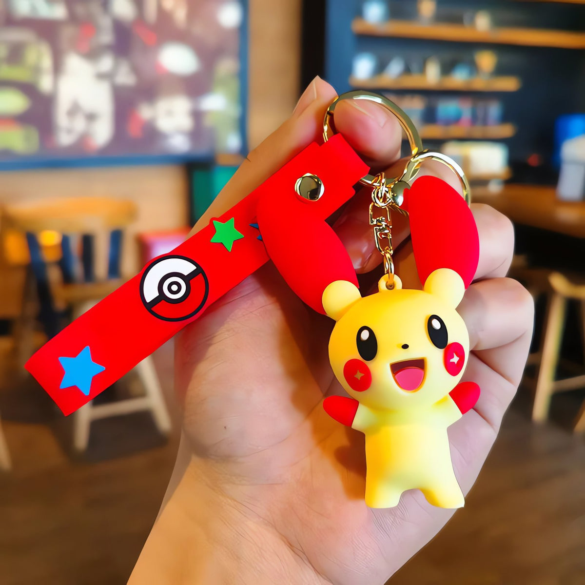 Pokémon keyrings with Pikachu and Charmander – Plusle