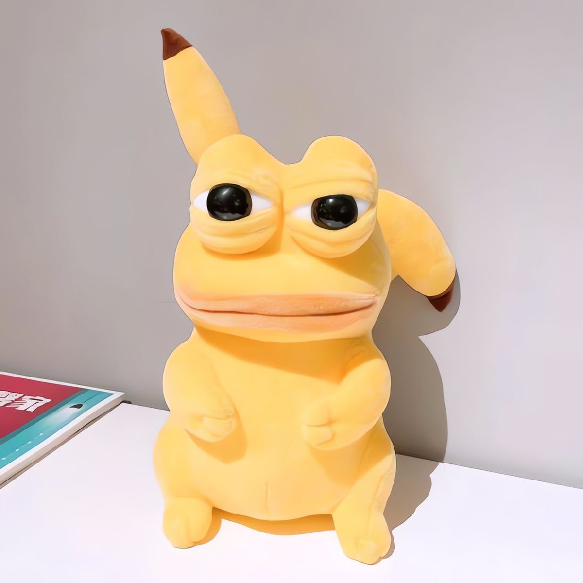 Sad Frog plush dressed in a Pokémon costume – Pikachu Yellow