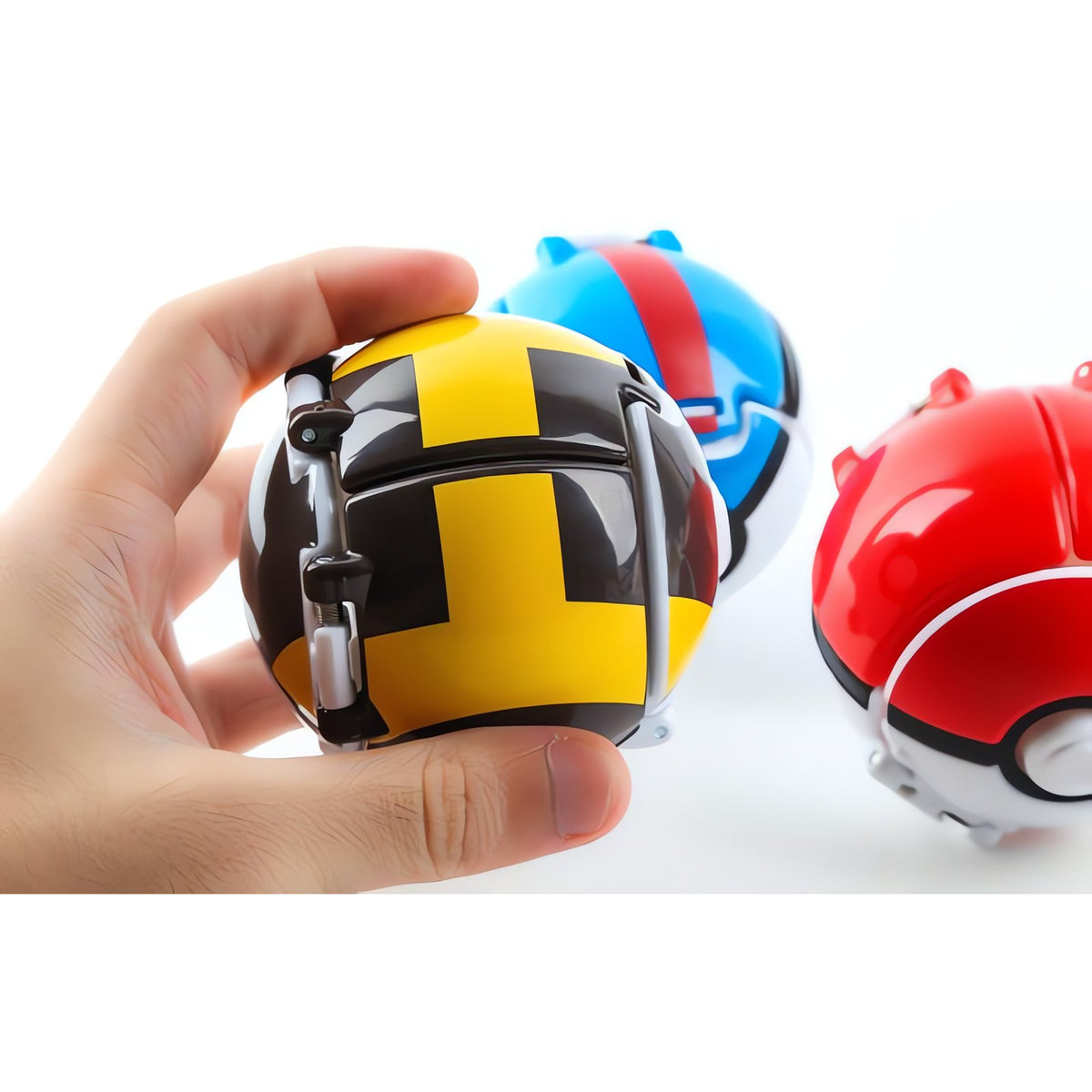 Set of four Poké Balls with Pokémon figures – photo 3