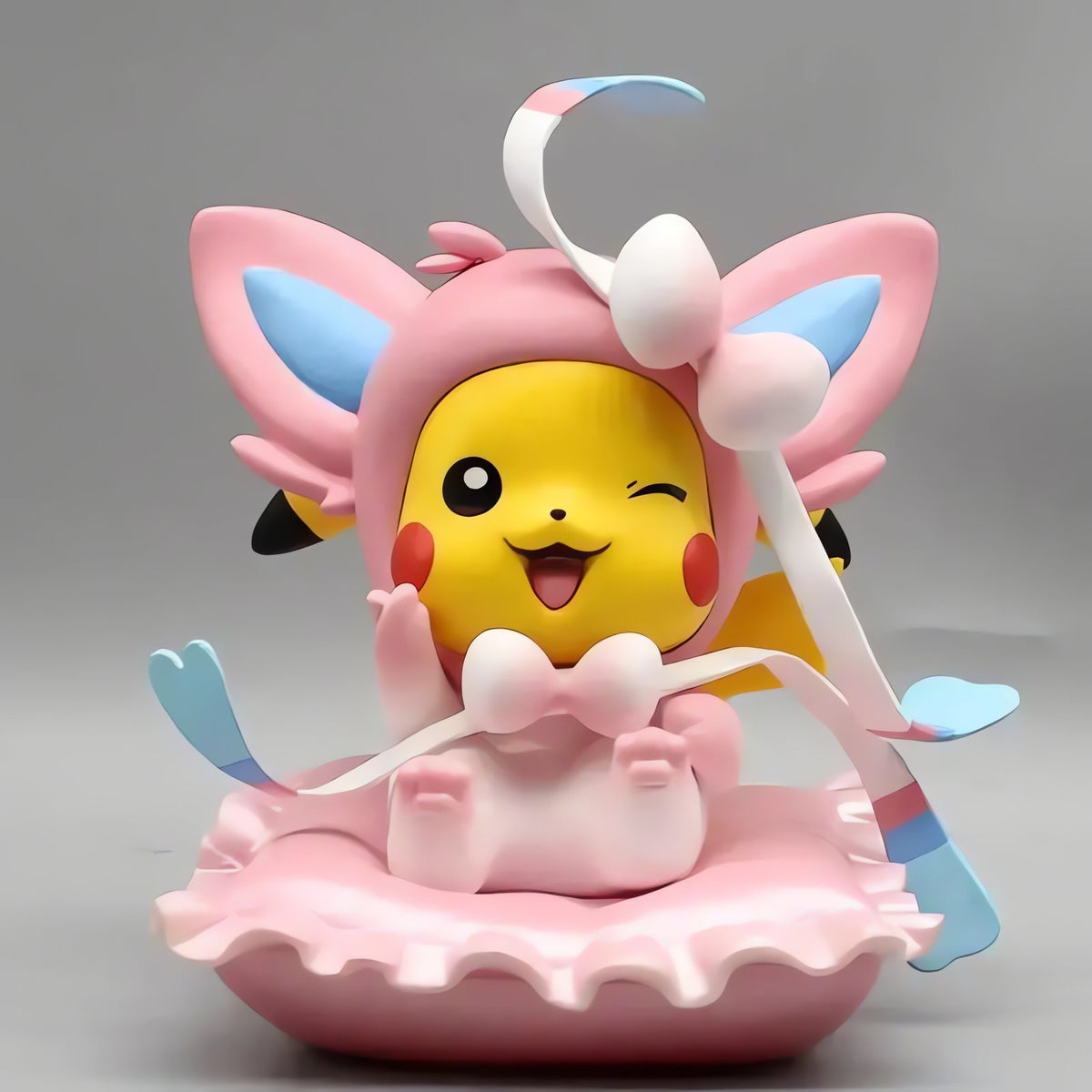 Pikachu cosplay figures in Pokémon costumes – Eevee