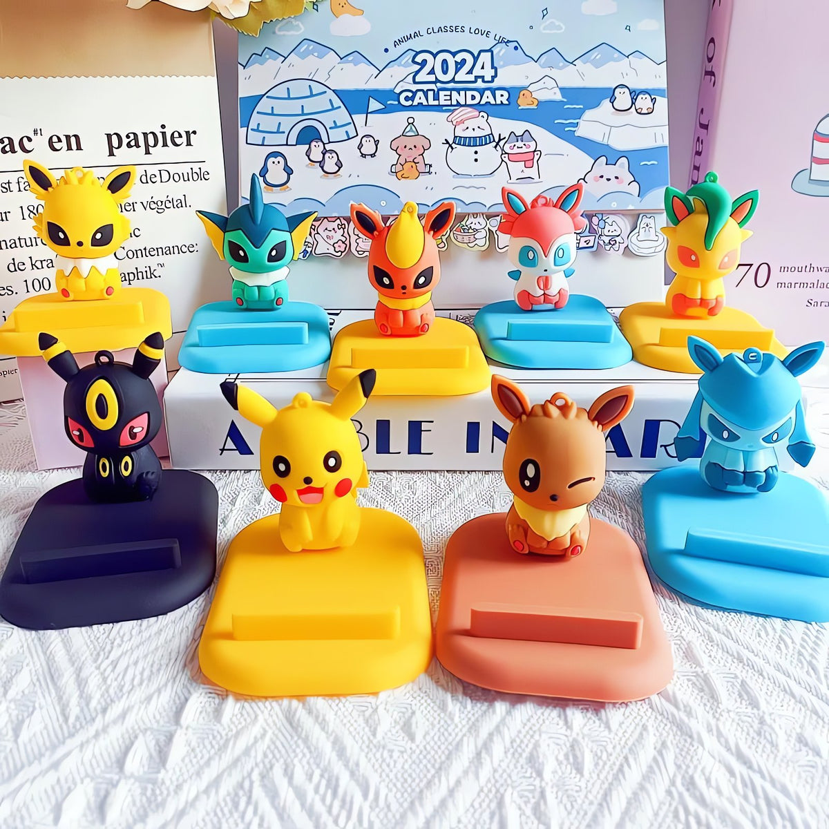 Pikachu and Eevee evolutions Pokémon phone stand