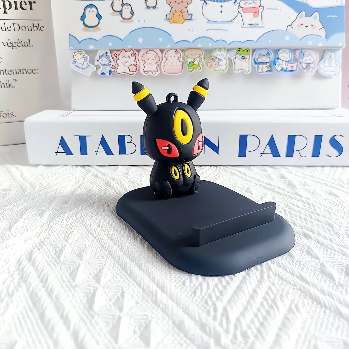 Pikachu and Eevee evolutions Pokémon phone stand – Umbreon