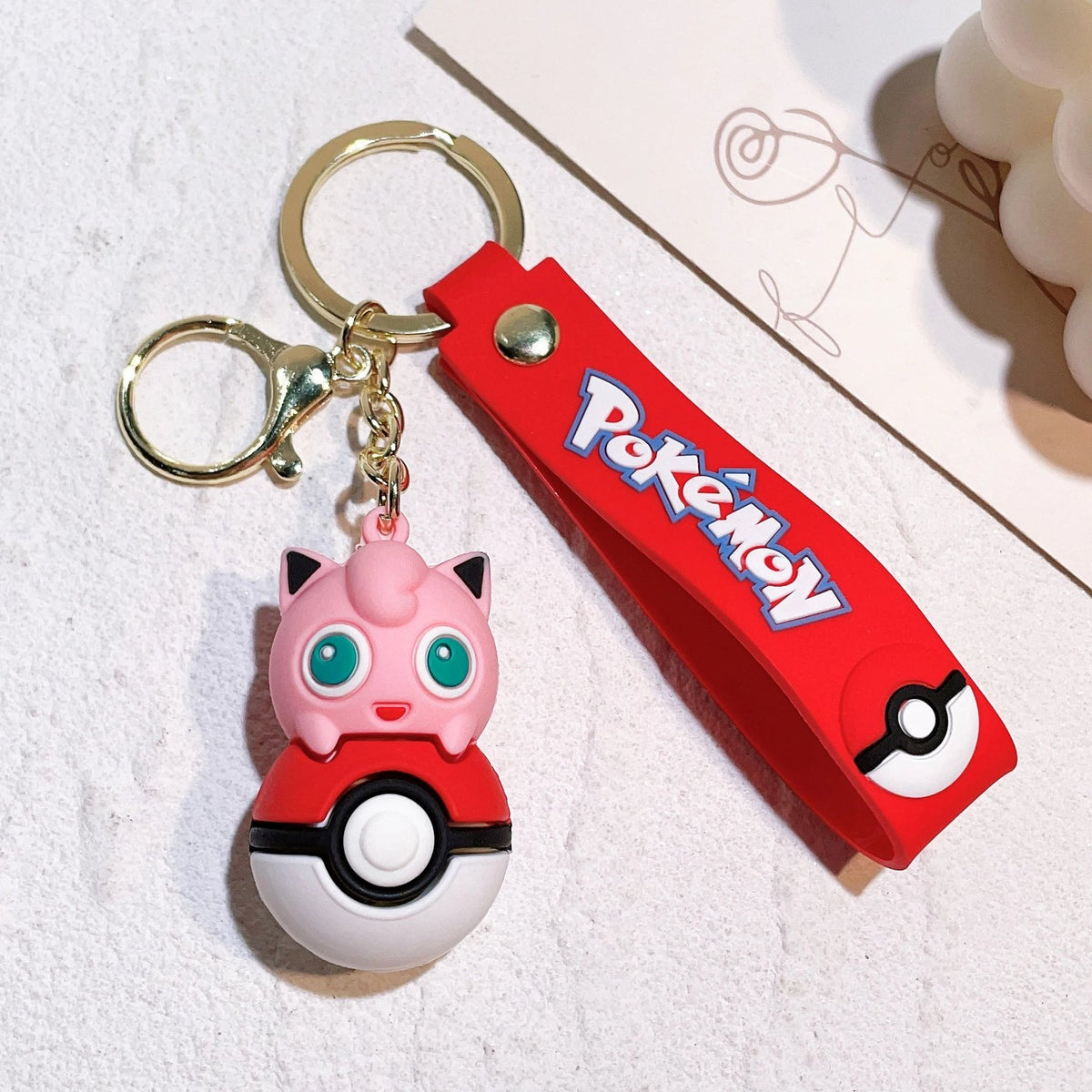 Poké Ball keyring with Pokémon figure charm – Jigglypuff