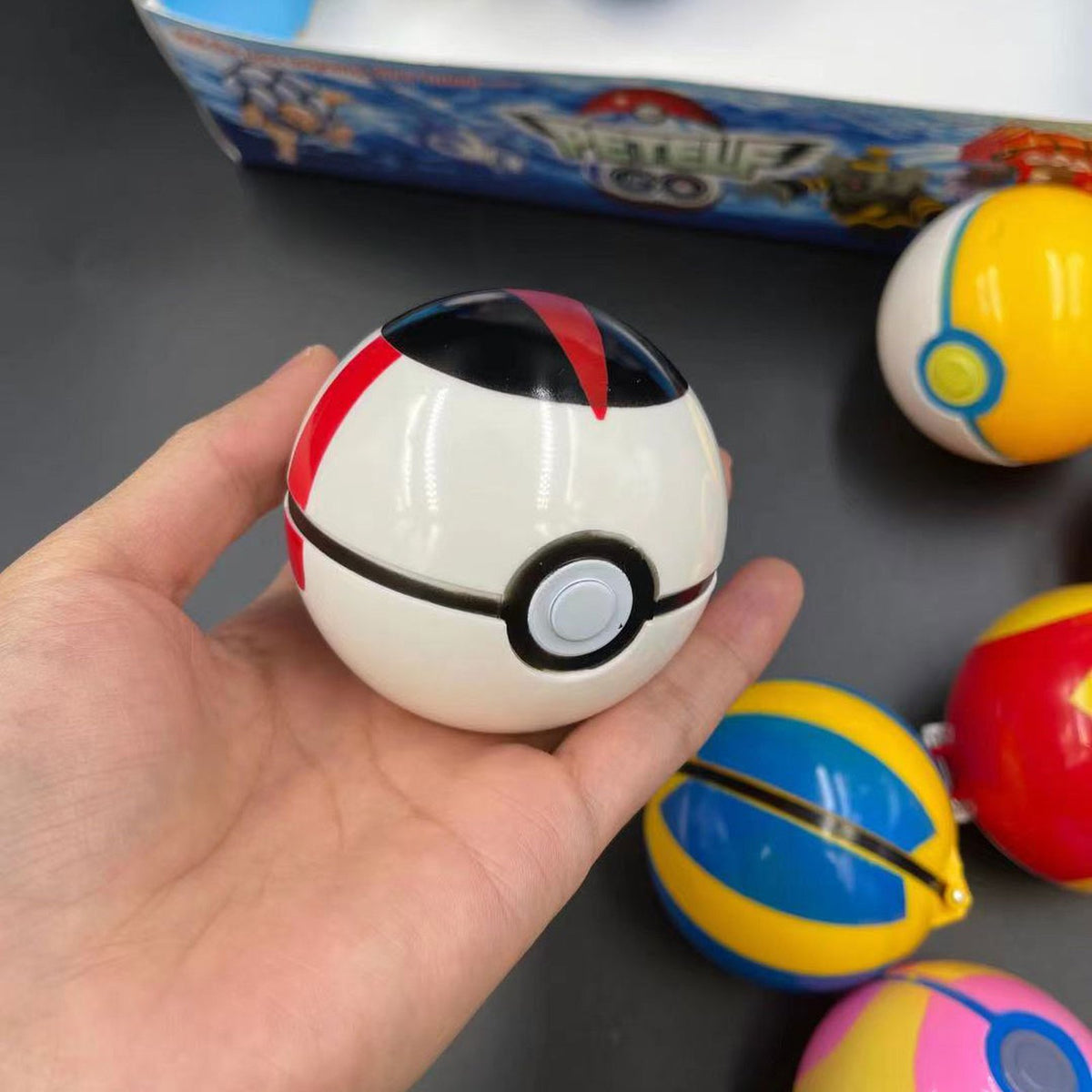 Set of eight large Poké Balls with figures – photo 13