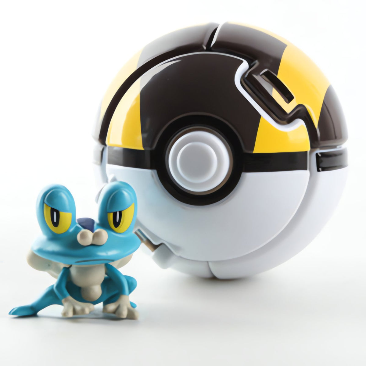 Poké Ball with a mini Pokémon figure – Froakie