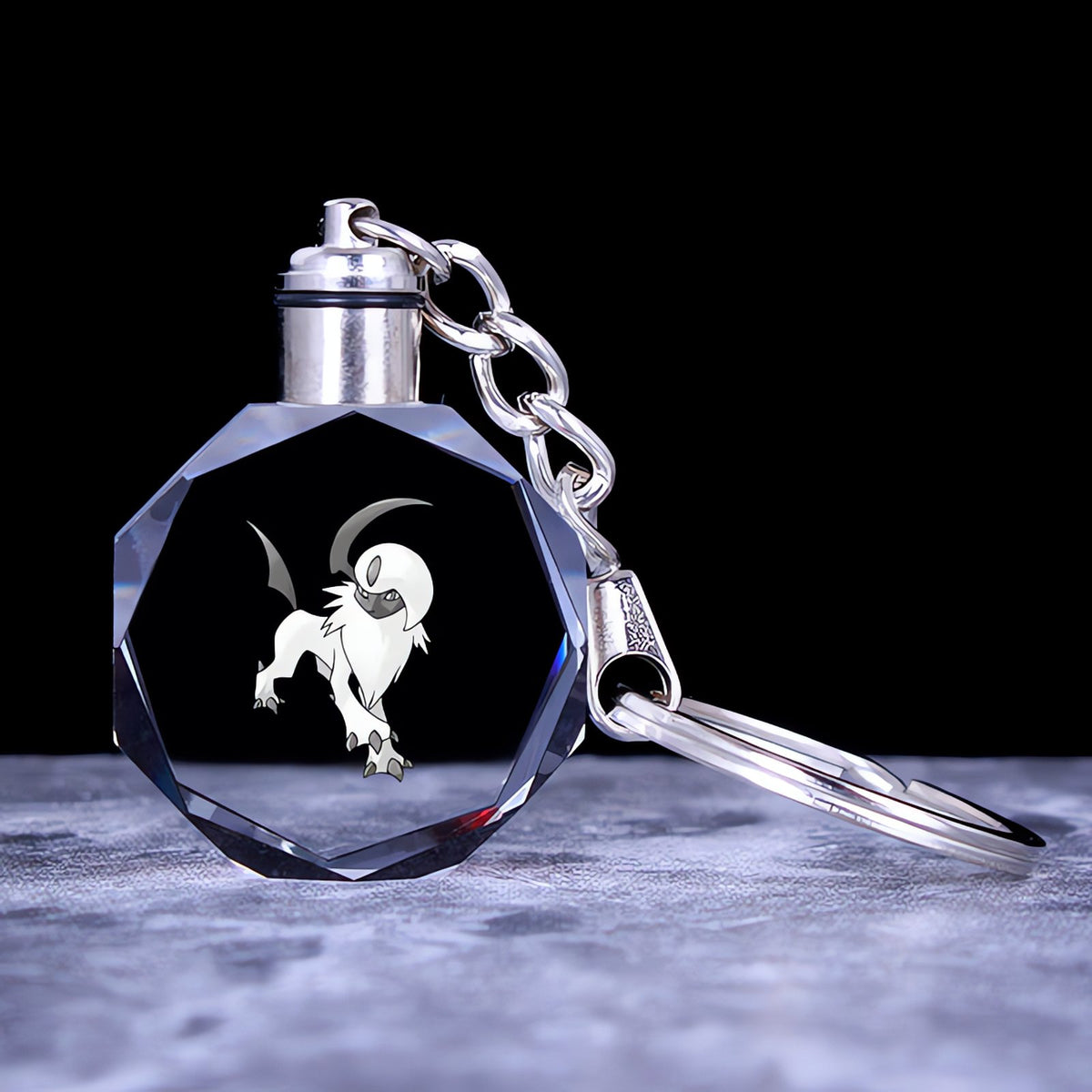 Pokémon crystal keyring with a glowing 3D Pokémon – Absol