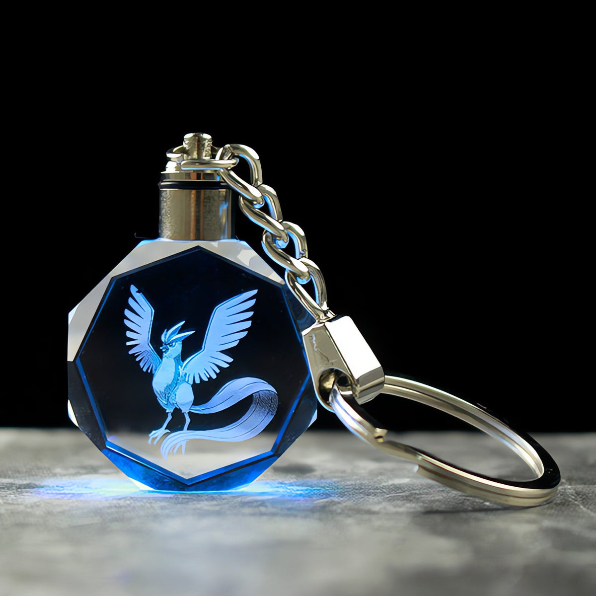 Pokémon crystal keyring with a glowing 3D Pokémon – Articuno