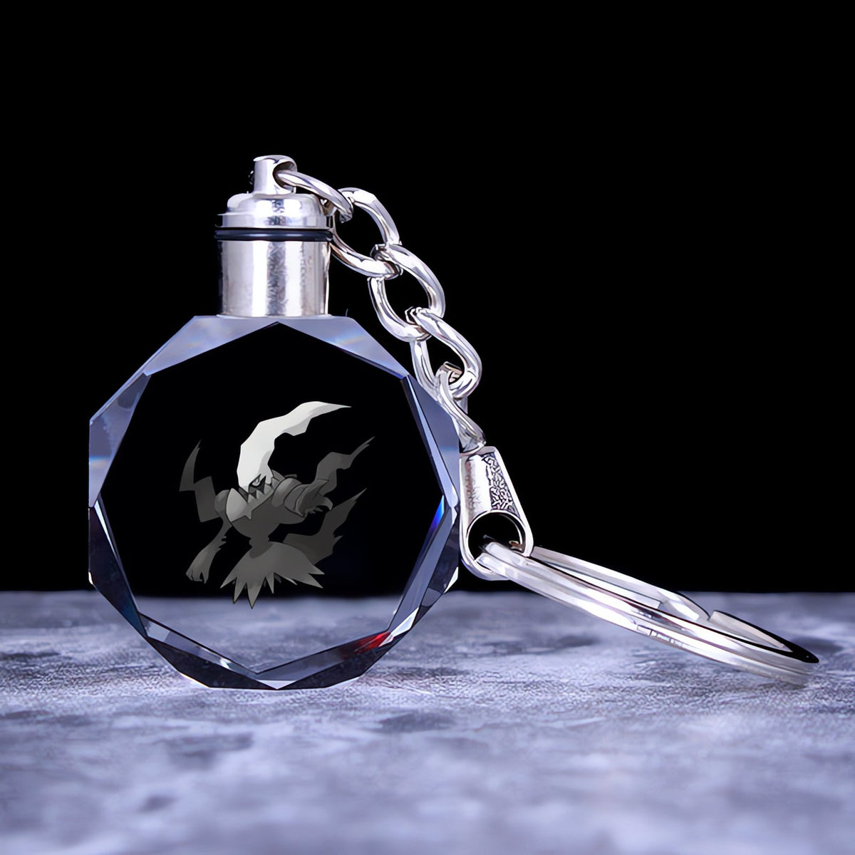 Pokémon crystal keyring with a glowing 3D Pokémon – Darkrai