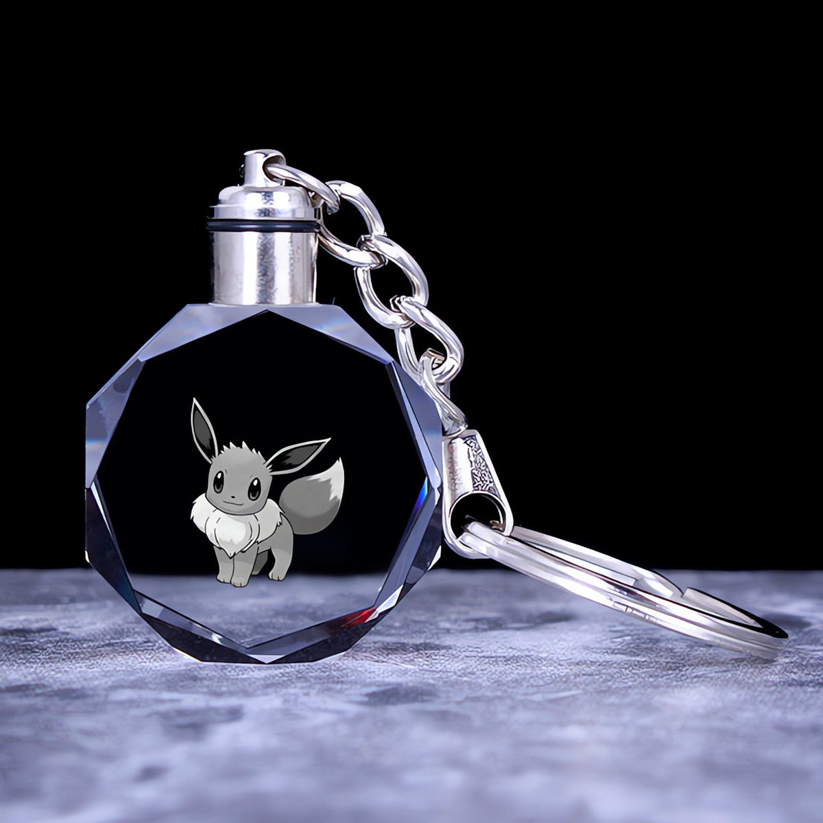 Pokémon crystal keyring with a glowing 3D Pokémon – Eevee