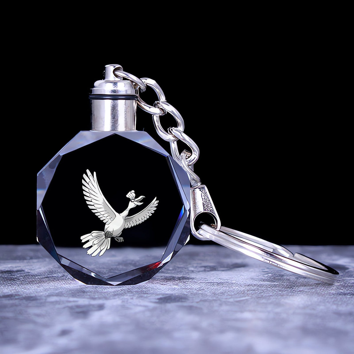 Pokémon crystal keyring with a glowing 3D Pokémon – Ho-Oh