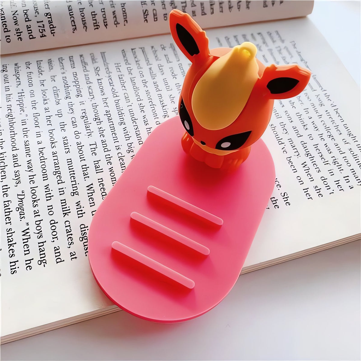 Pokémon phone holder with Eevee evolution figure – Flareon