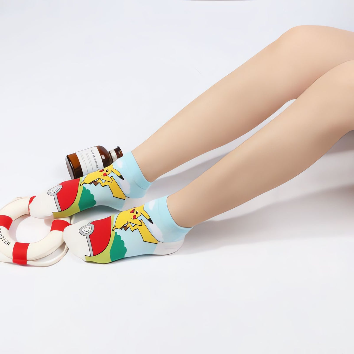 Colourful Pokémon socks with a Poké Ball kick design – Pikachu