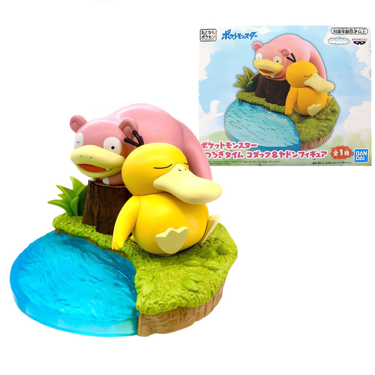 Slowpoke and Psyduck figure resting by a tree stump – photo 2